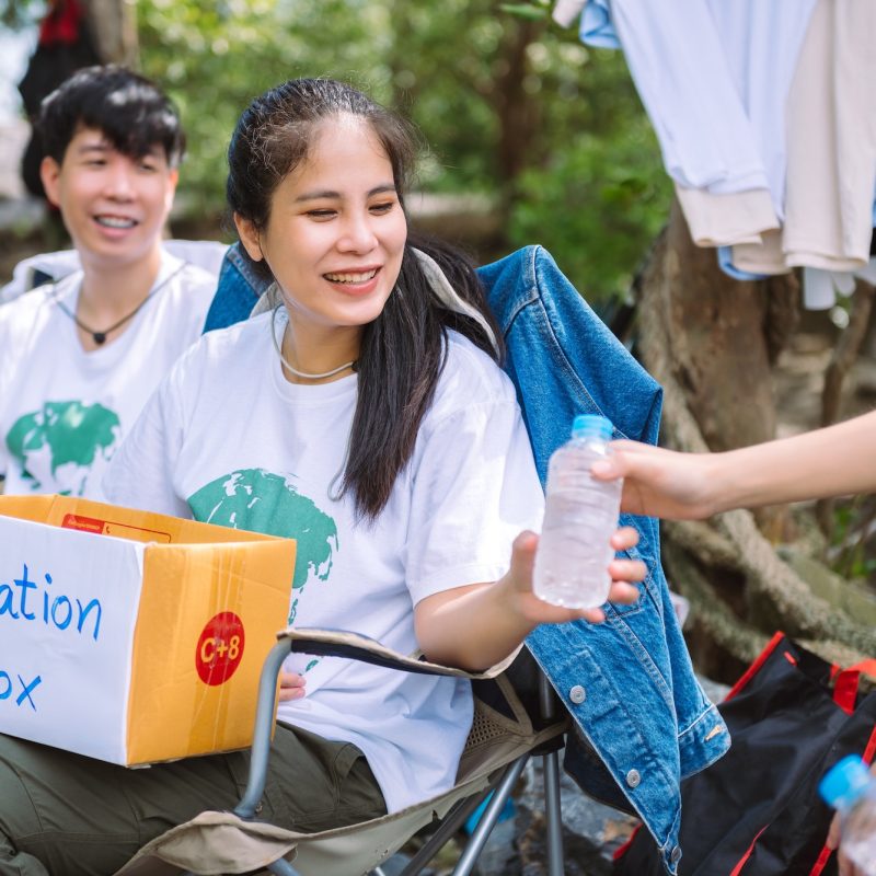 group-of-asian-diverse-people-volunteer-holding-a-donation-box-for-fundraiser-to-emergency-situation-q50w3fq39mh4teh1z25gd59biepc54x38vyphi18hs