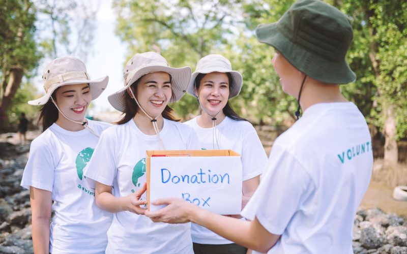 group-of-asian-diverse-people-volunteer-holding-a-donation-box-for-world-environment-day-campaign--q4yc8qbqodsq7vmgsztanrfulromrwlftr9cenc6mg